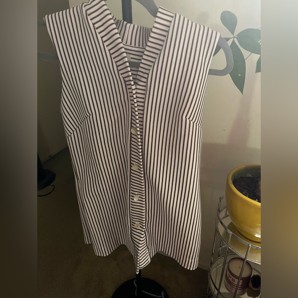 Cute vintage long vest. 25in length.